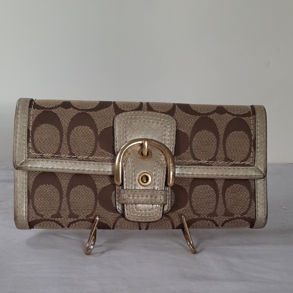 Coach Tan and Cream Clutch with Gold Buckle